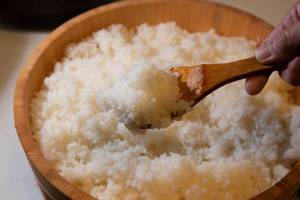 istock Freshly Prepared Sushi Rice in a Wooden Hangiri 2201979374