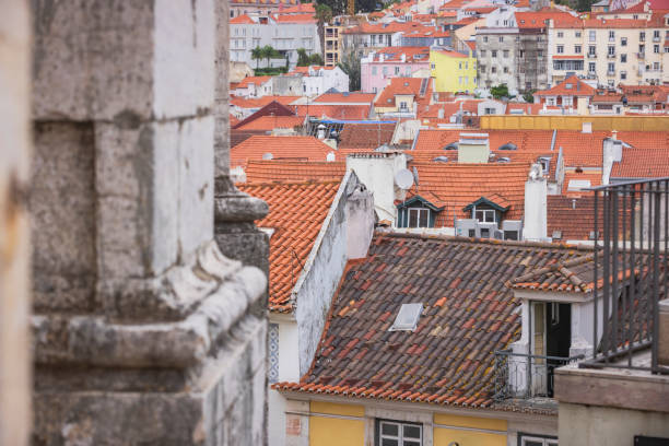 high angle view of the rooftops of the Alfama district of Lisbon at daytime (Portugal).