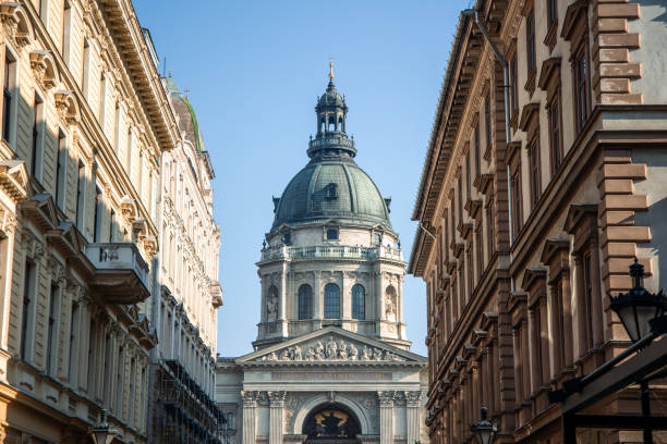 02/17/2025, Budapest. St. Stephen's Basilica, a prominent landmark in Budapest, Hungary, is viewed from a narrow street, showcasing its architectural grandeur and historical significance