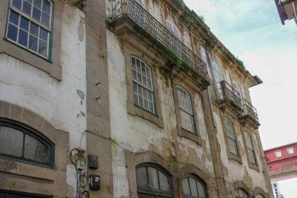 istock old buildings in a street in Chaves 2201985172