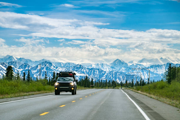 Pickup truck crossing a mountain pass in Alaska