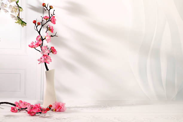 istock Abstract spring flower arrangement with cherry blossom branches in vase,elegant beauty concept,stage for product display and business concept.Minimal modern aesthetics 2201999895