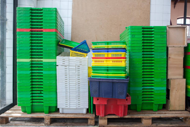 istock Fish containers compactly stacked together at wholesale market 2202002437