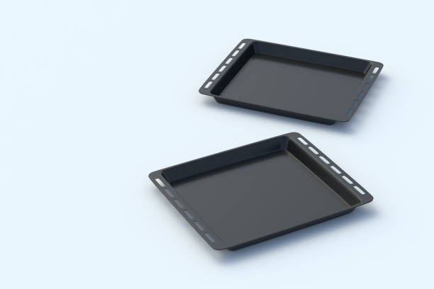 istock Two baking trays for oven on light gray background. Kitchen equipment. Cooking accessories. Copy space. 3d render 2202003071