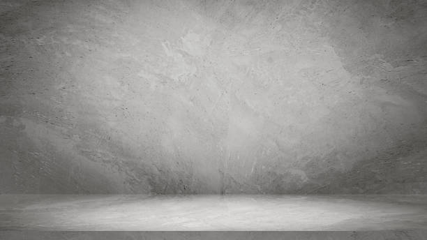 istock Empty grey cement wall floor and wall room loft style, Luxury backdrop, Perspectives background of nature cement texture with shadow from the sun, Well display product and text present on free space. 2202003761