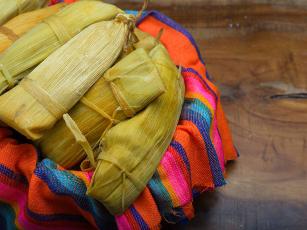 istock Tamales on a colorful tablecloth. Mexican food. Copy space 2202004327