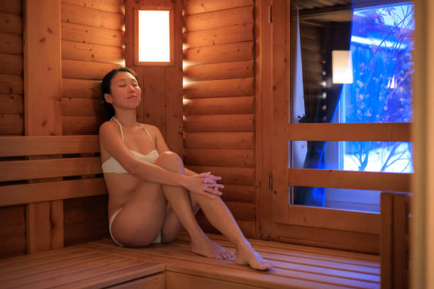 istock Young woman enjoying Sauna SPA 2202006189