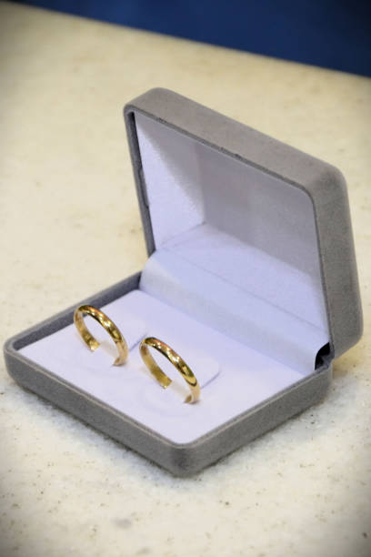 istock Gold rings in the box for wedding 2202006701