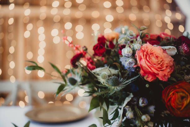 Close up of flower arrangement on table at wedding reception
