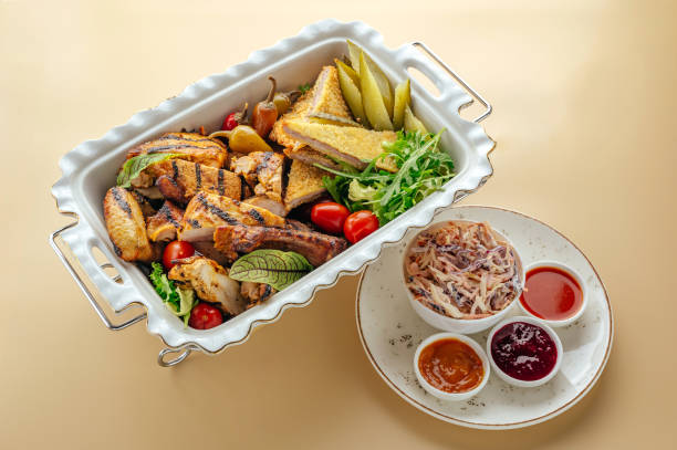 istock baked cold cuts with sauces and appetizers 2202008722