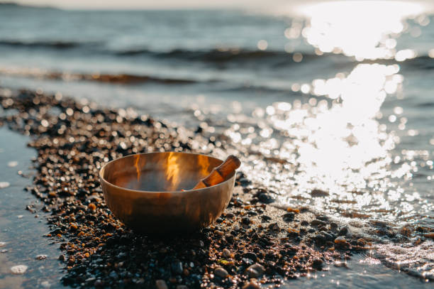istock Sound Healing at the Beach - Tibetan Singing Bowl 2202009498