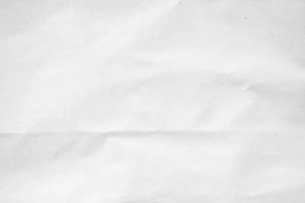 White recycled craft paper texture as background. Grey paper texture, Old vintage page or grunge vignette of old newspaper. Pattern rough art creased grunge letter. Hardboard with copy space for text. White recycled craft paper texture as background. Grey paper texture, Old vintage page or grunge vignette of old newspaper. Pattern rough art creased grunge letter. Hardboard with copy space for text.