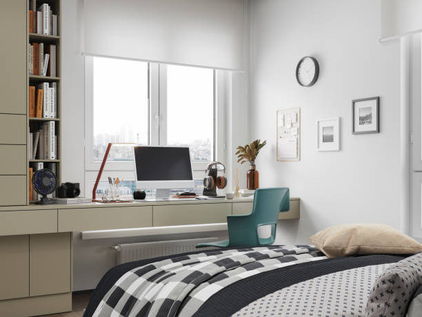 istock Modern Bedroom Interior With Study Desk, Computer And Rear View Of Bed 2202016231