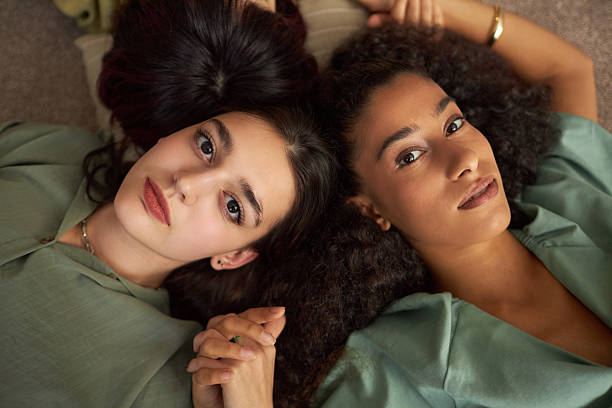 istock Female Best Friends Holding Hands 2202023194