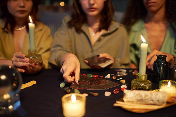 istock Young Women Reading Tarot Cards 2202024746