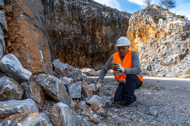 istock Geologist inspecting a mine,Explorers collect soil samples in search of minerals. 2202027131