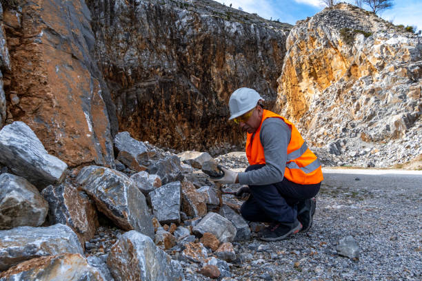 istock Geologist inspecting a mine,Explorers collect soil samples in search of minerals. 2202027140
