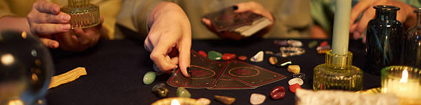 istock Young Women Reading Tarot Cards Header 2202028904