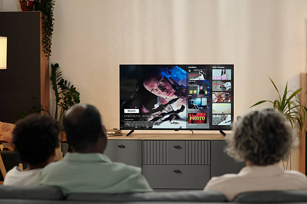 istock Watching Movie Together on Screen at Home During Evening 2202029105