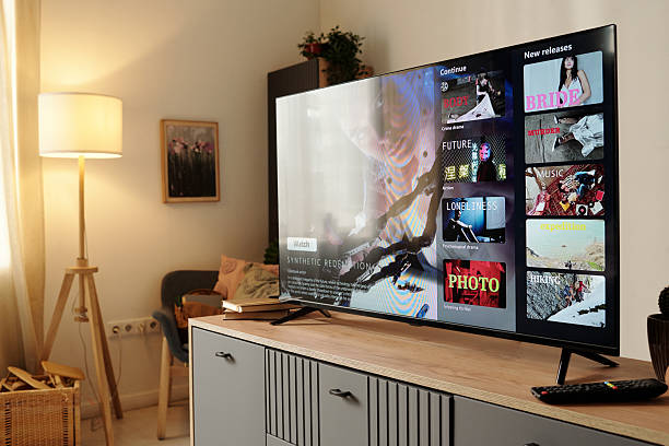 istock Viewing Entertainment on Modern Flat-Screen TV in Cozy Room 2202029299
