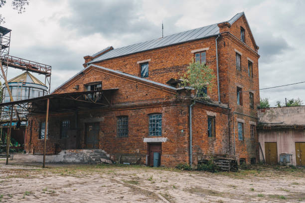istock old abandoned brick warehouse or small factory 2202029471