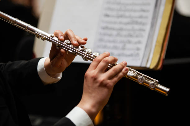 istock Hands of a musician playing the flute 2202029752