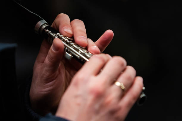 istock Hands of a musician playing the flute 2202029770