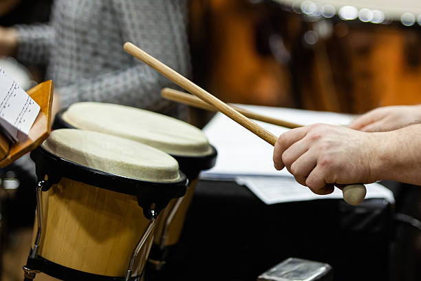 istock Hands of a musician playing drums 2202029839