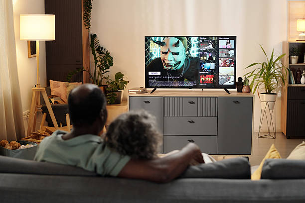 istock Watching Movie Together in Cozy Living Room Setting 2202030458