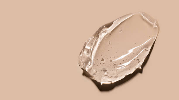 istock cosmetic texture gel essence smear on a beige background 2202032926