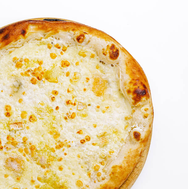 istock Delicious white pizza with a crispy crust and melted cheese sitting on a wooden serving board 2202036127