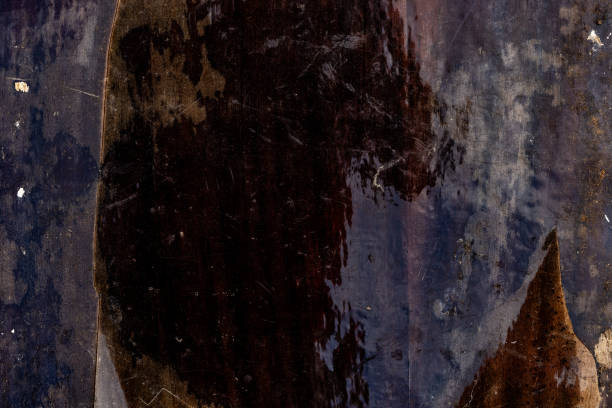 Close view of a rustic wooden surface showcasing dark tones, visible textures, and natural aging. Ideal for use as a backdrop or to emphasize a weathered, natural, and earthy aesthetic.