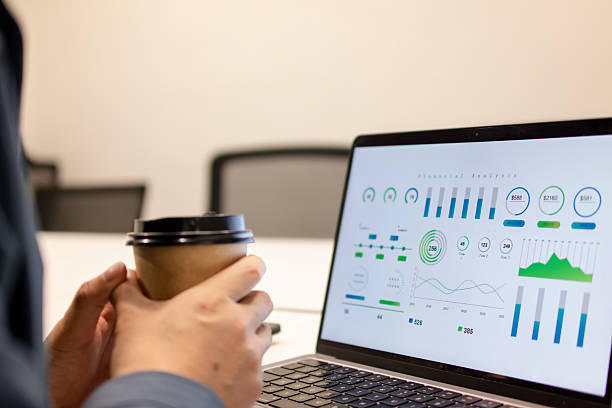 istock The financial statements on the laptop 2202040677