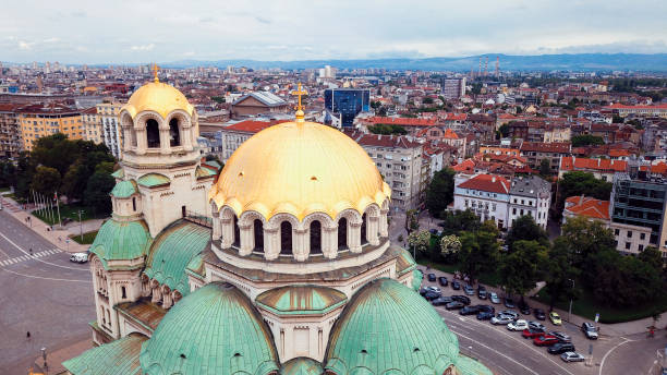 istock Golden domes of Alexander Nevsky Cathedral overlooking Sofia skyline 2202041442