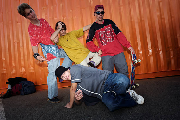 istock Group of Young Friends Posing with Skateboards 2202045816