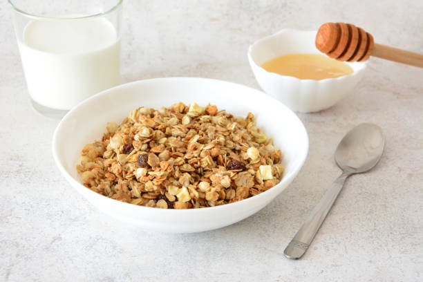 istock Honey Granola with Milk in the bowl 2202047666