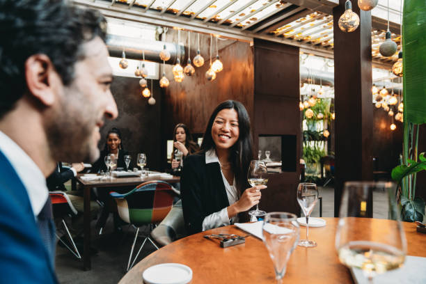 istock Colleagues are talking together at the restaurant during a meeting 2202051088