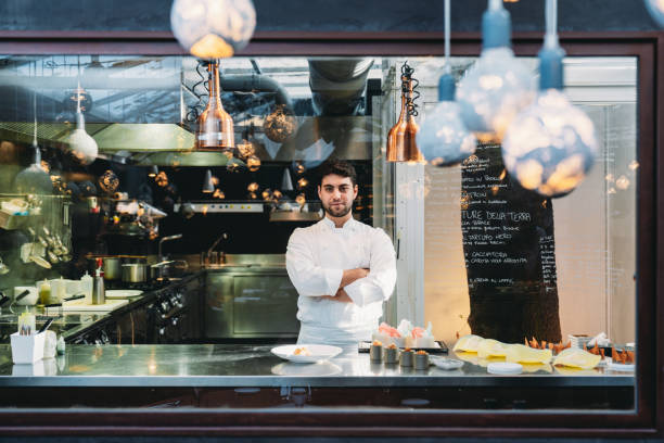 istock Portrait of a chef in his restaurant's kitchen 2202051089