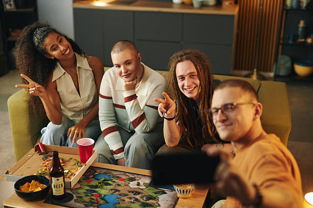 istock Diverse Group of Friends Playing Board Games 2202052561