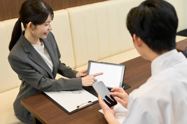 istock A businesswoman selling digital tools at a restaurant 2202055482