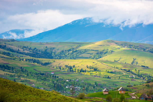 istock mountainous rural landscape in spring 2202059977
