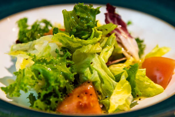 istock seasoned salad on the dish 2202066136