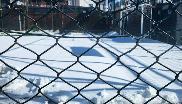 istock Soccer field on winter day 2202066720