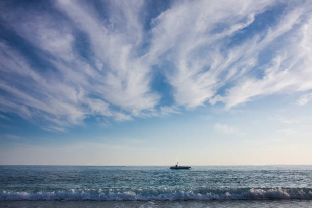 a beautiful ship is sailing in the blue sea