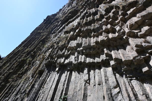 Young climber rock climbing