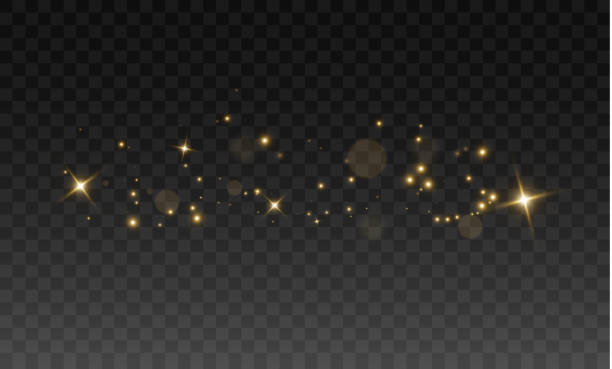 istock Magical Golden Stardust and Soft Glowing Light Sparkles, Fantasy Dreamy Glitter Trail with Bokeh and Blurred Highlights for Christmas, New Year, Fairy Tale, and Luxury Elegant Designs 2202068107