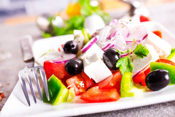 istock Salad with cheese and fresh vegetables . Greek salad. 2202069568
