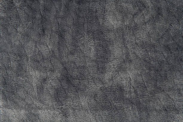 Close up high resolution photo of gray suede leather material texture