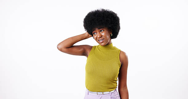 istock Confused, thinking and doubt of black woman with why, choice or dont know gesture on white background. Head scratch, uncertain and African model with questions, decision and clueless mockup in studio 2202072999