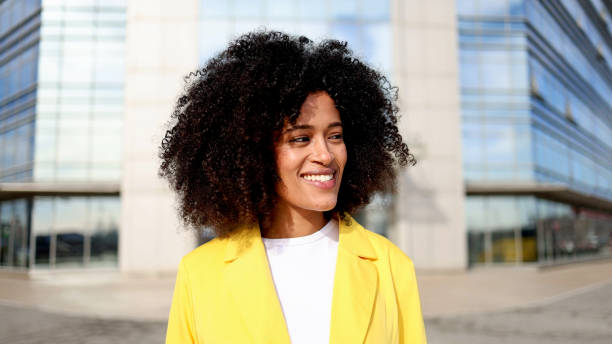 istock Young woman enjoying a city walk 2202075156